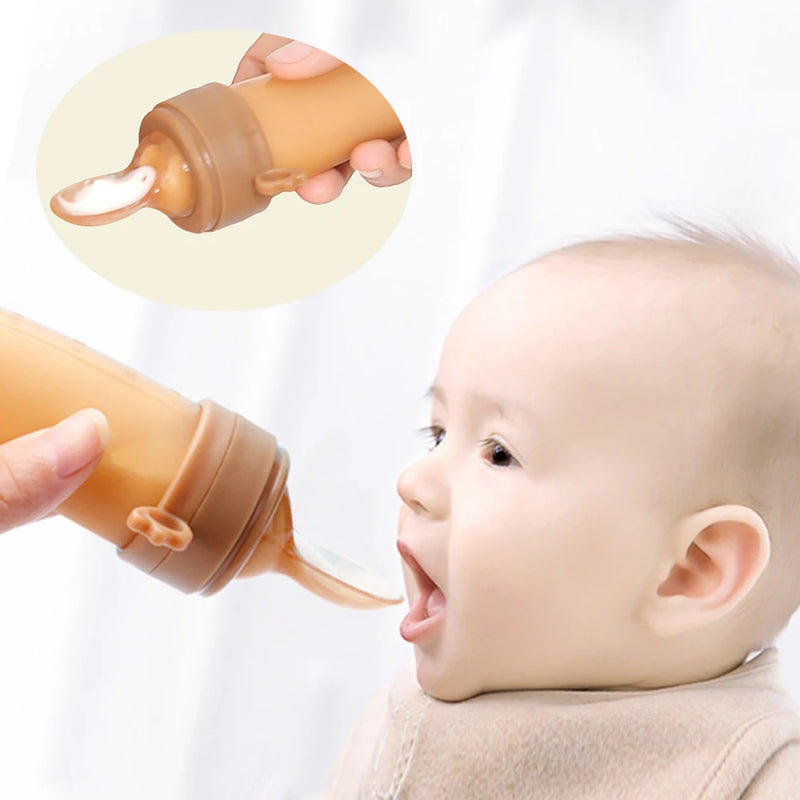 Teether Baby Silicone Rice Paste Cereal Feeding Squeeze Bottle Spoon Feeder for Newborn Child Utensils